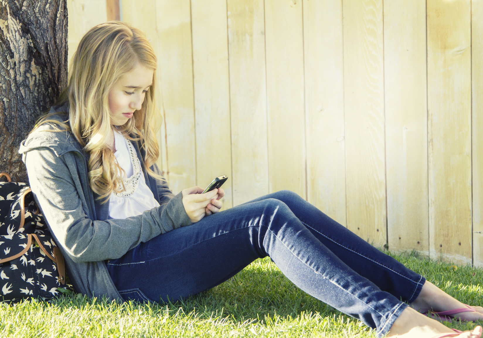 Teenage girl using a cell phone