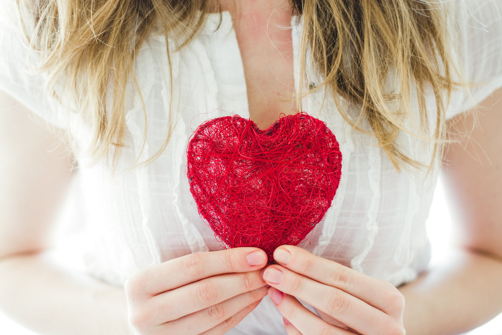 love concept, woman holding heart