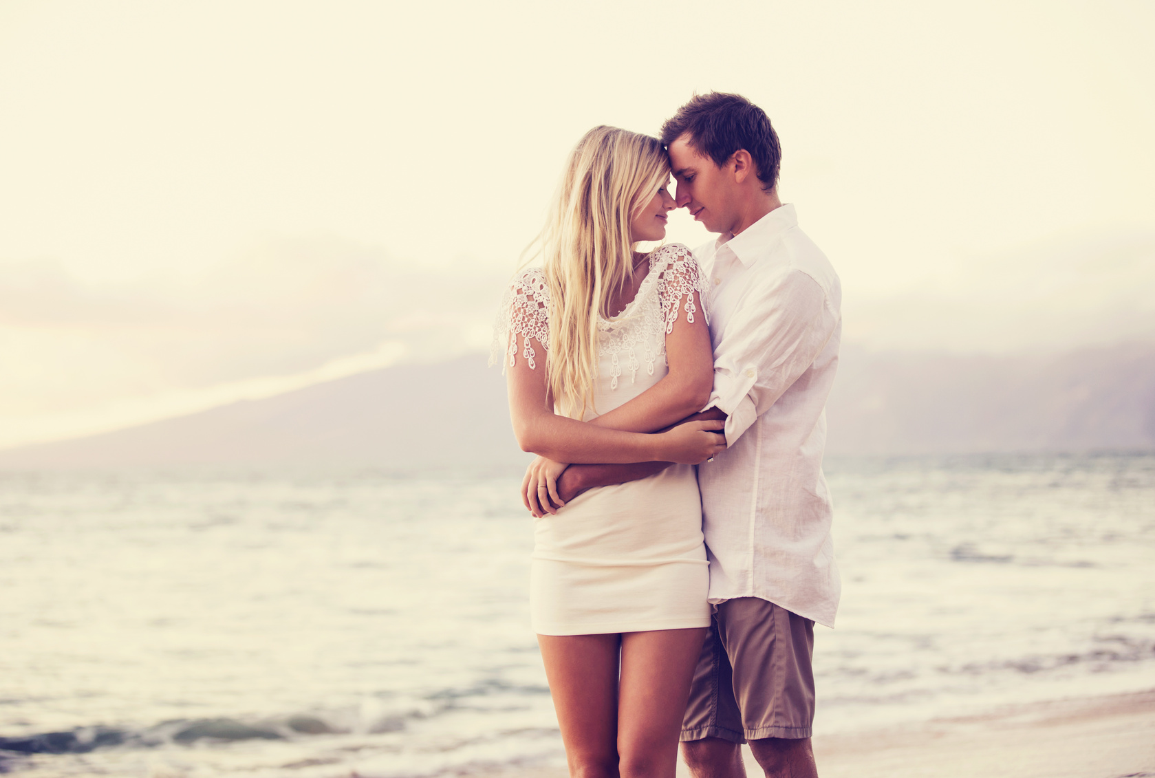 Couple on the beach sunset