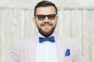 Young men smiling in fancy suit