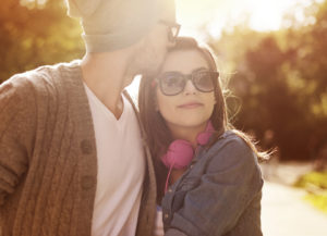 Loving young couple in sunlight