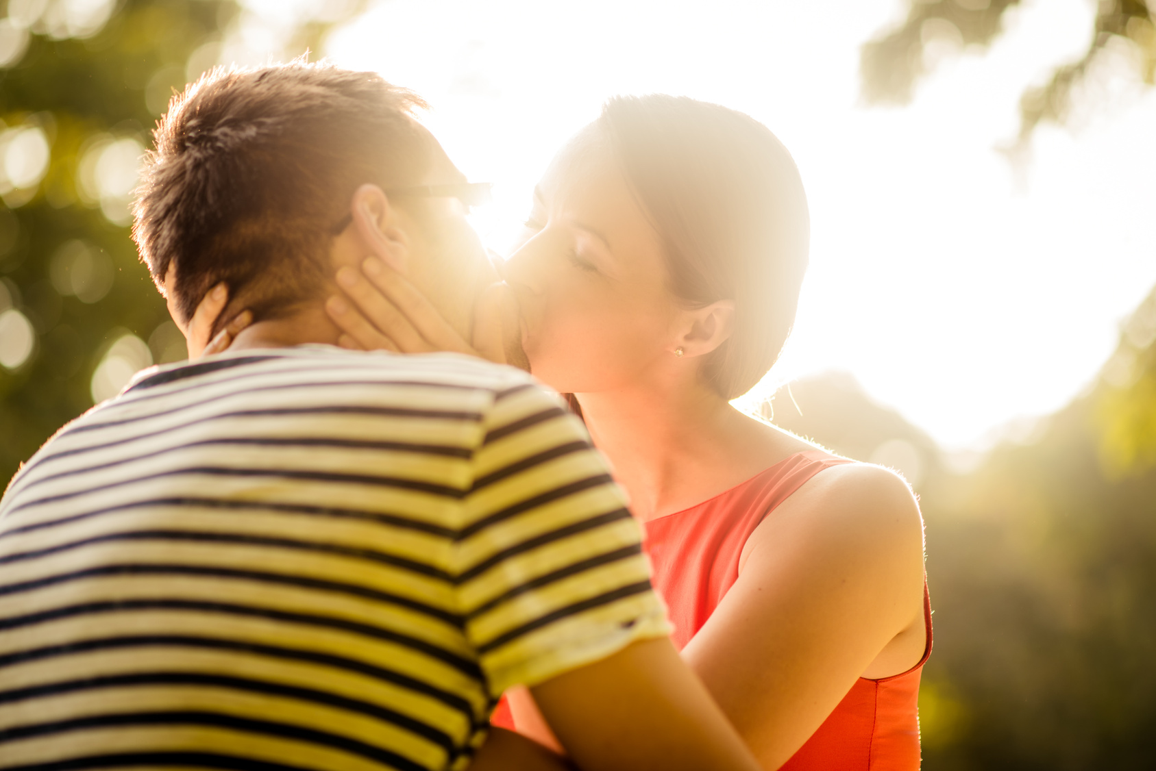 Couple kissing in nature