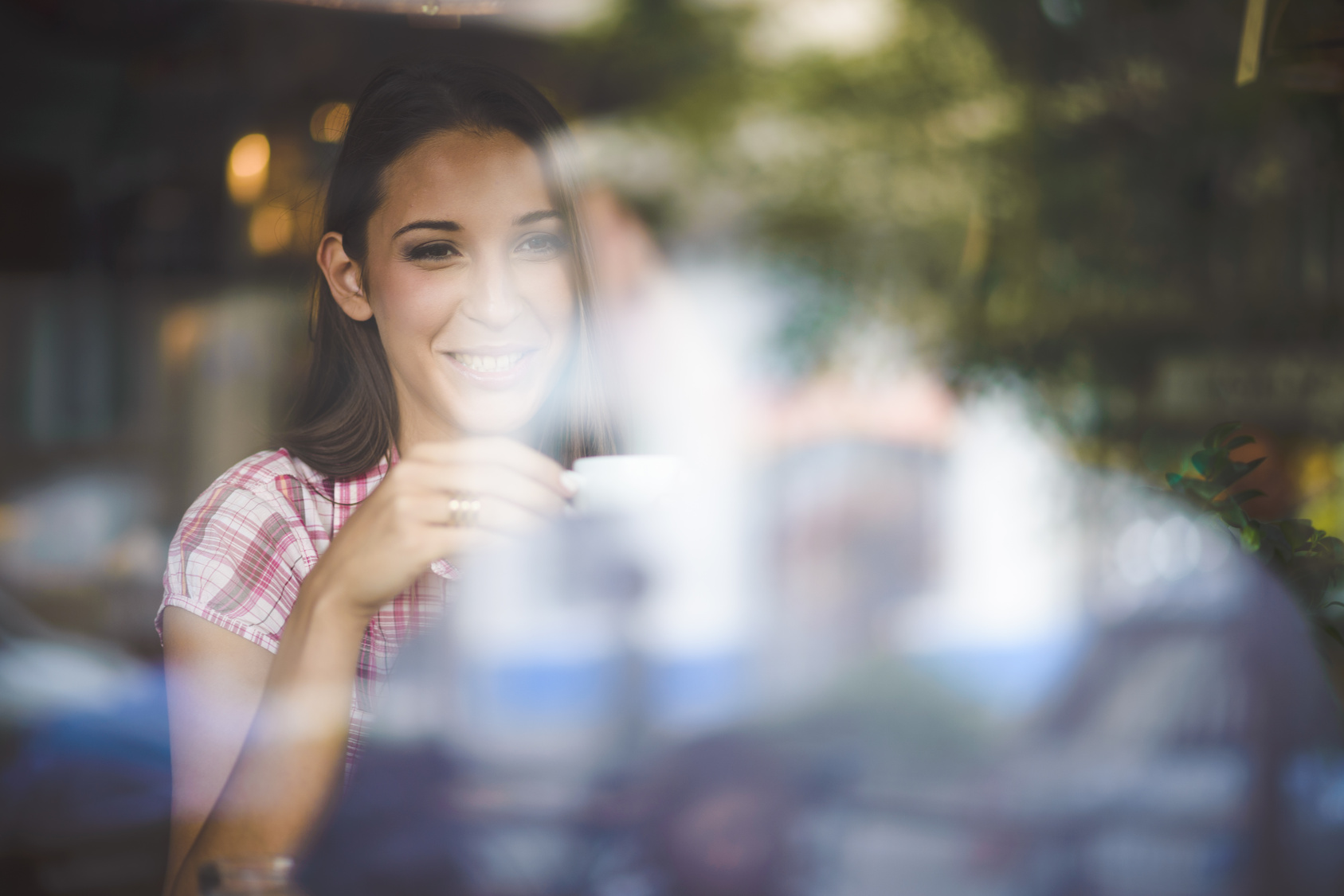 Young couple on first date drinking coffee