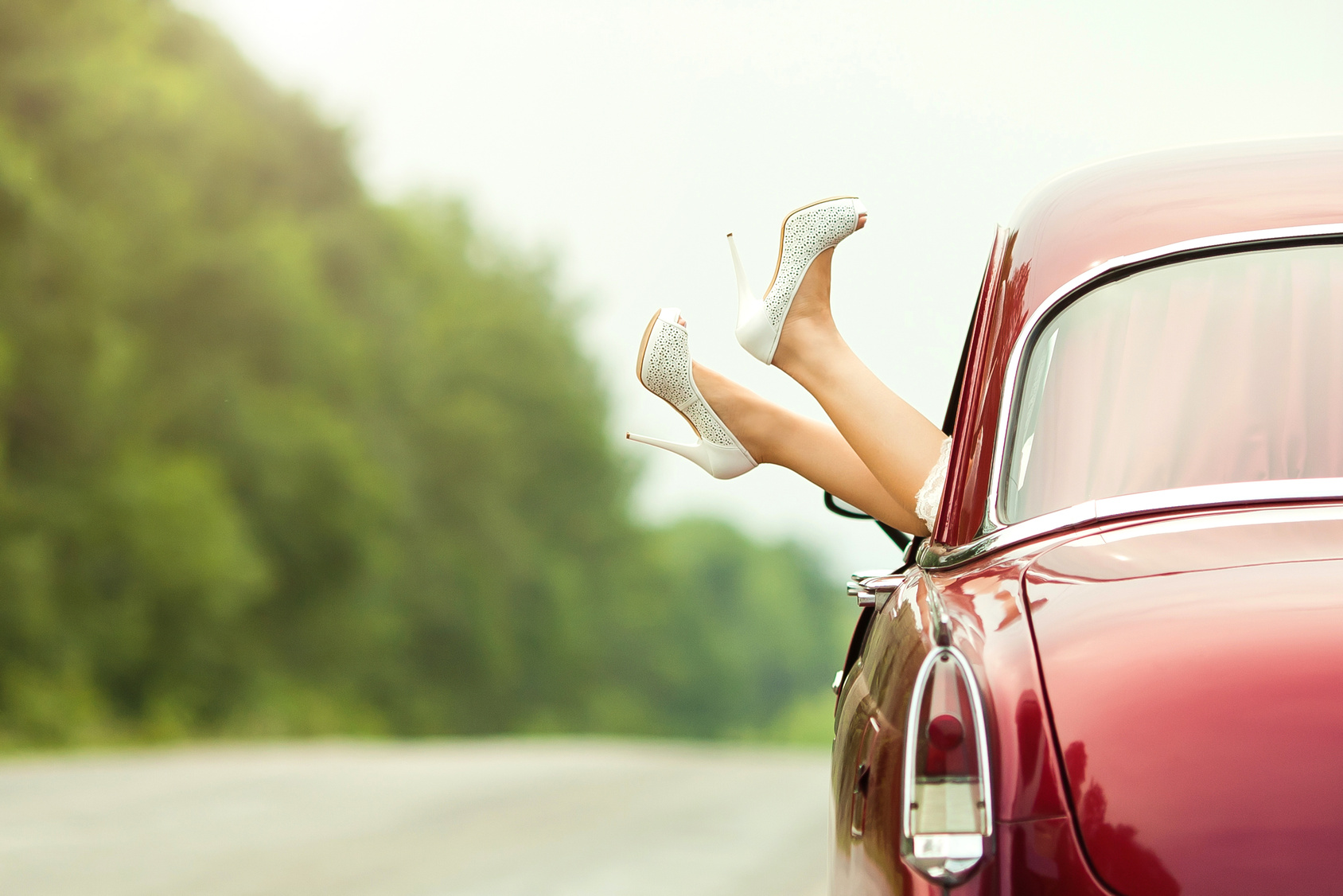 bride in wedding car