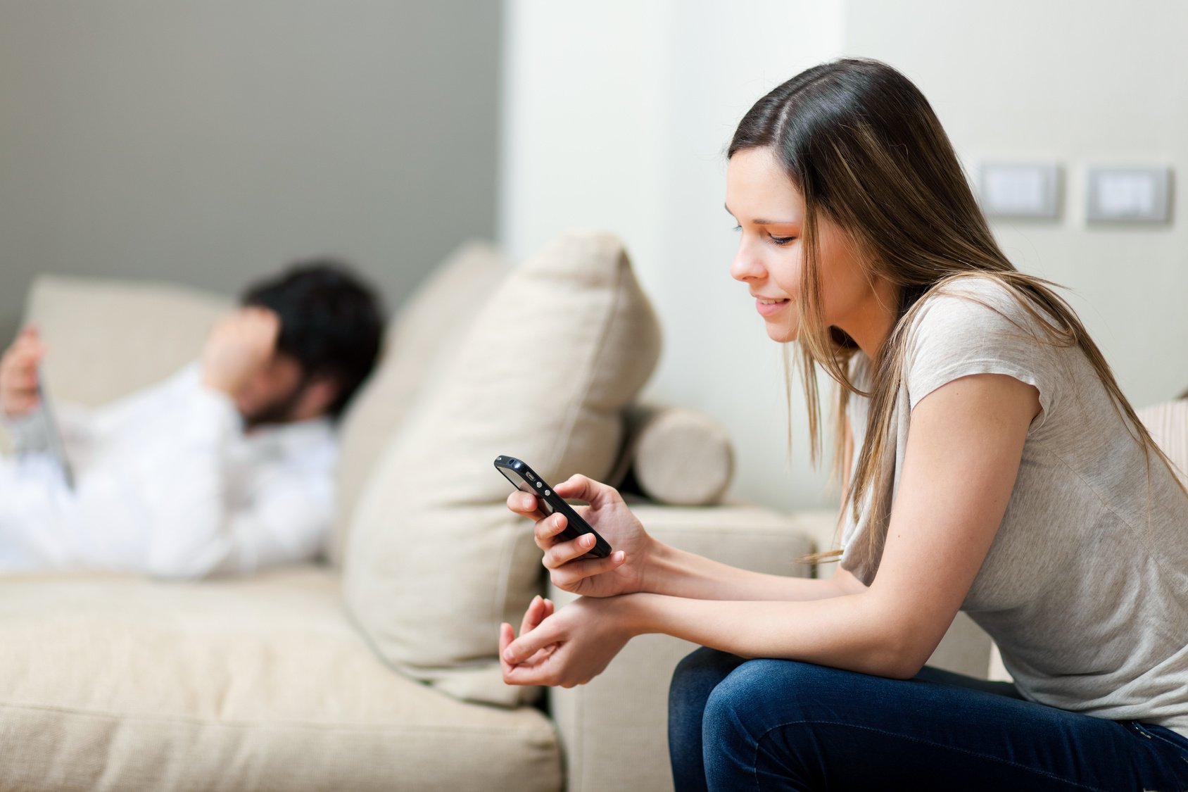 Woman sending a text message