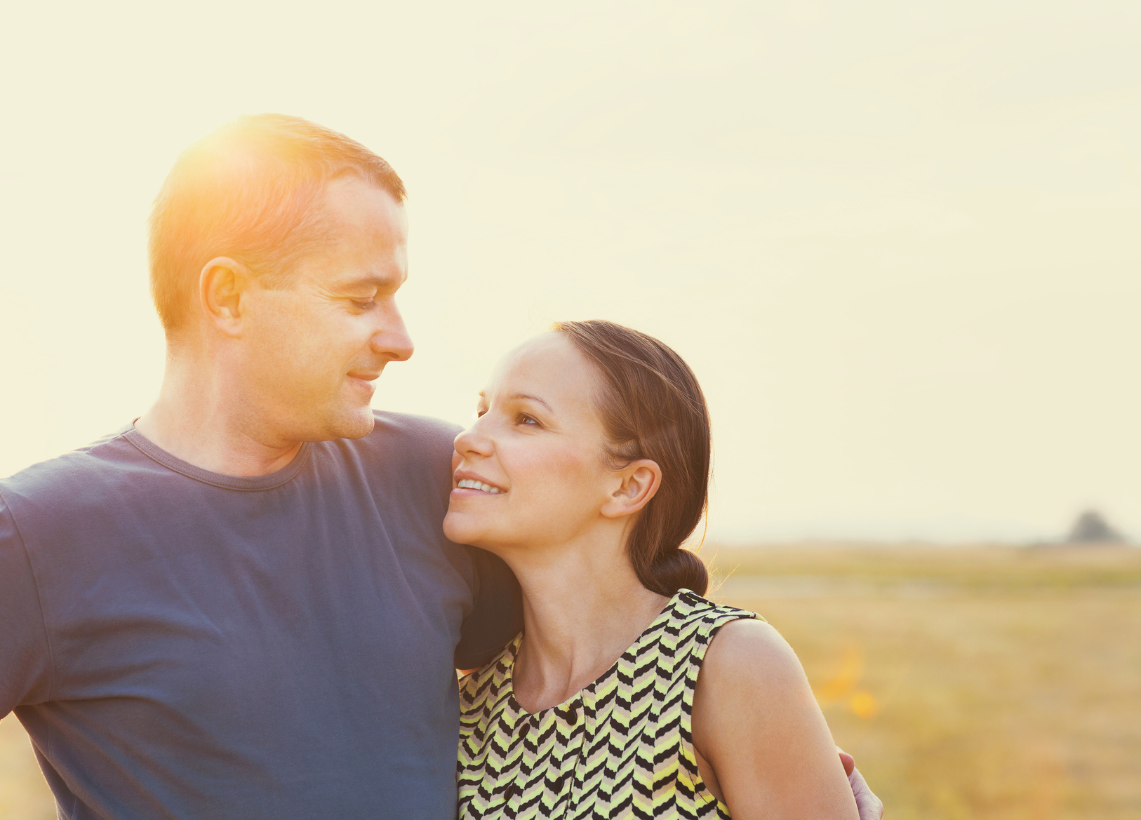 Young couple in love outdoor. Summertime.