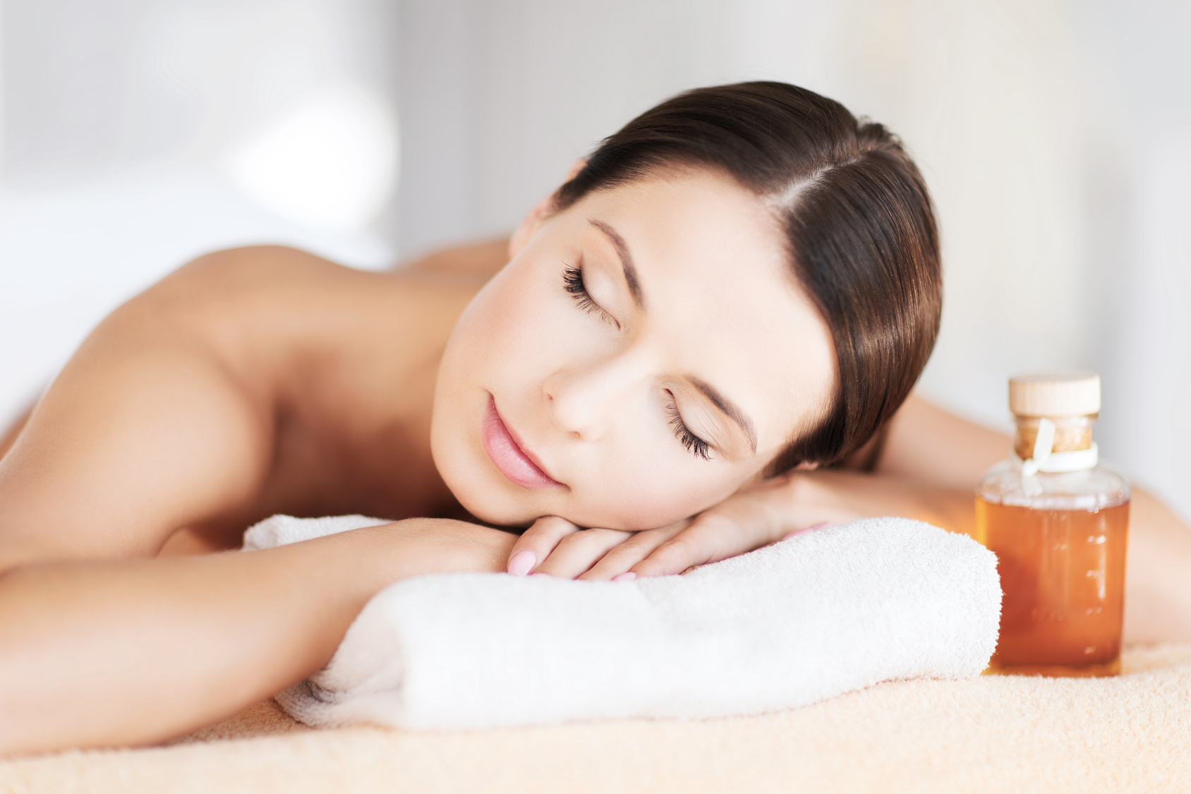 happy woman in spa salon