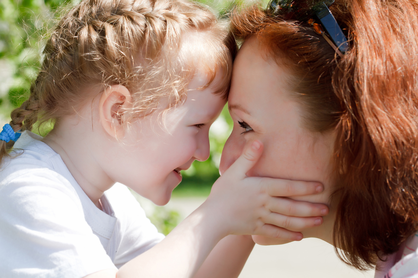 Young mother and her cute little daughter