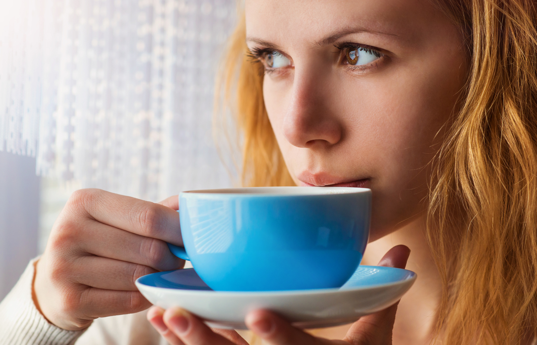 woman drink coffee blue cup