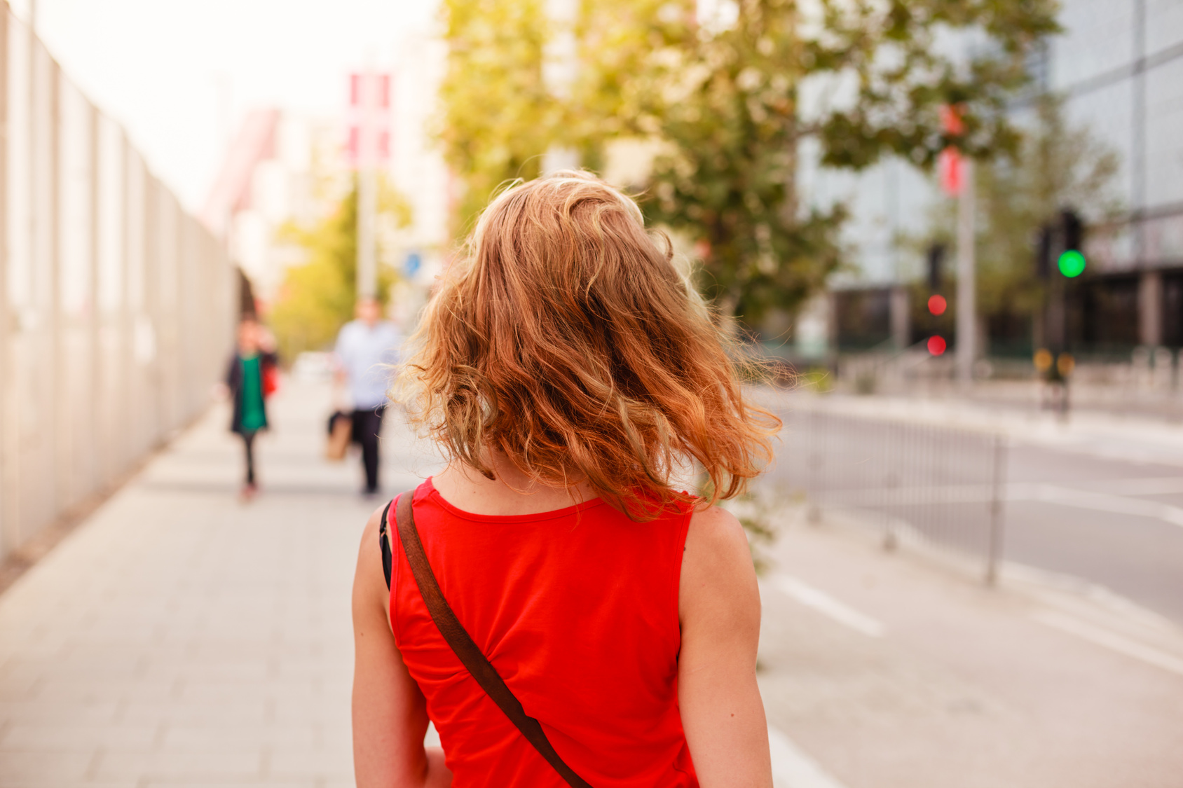 Young woman standing in the street