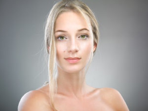 Portrait of beautiful woman with freckles