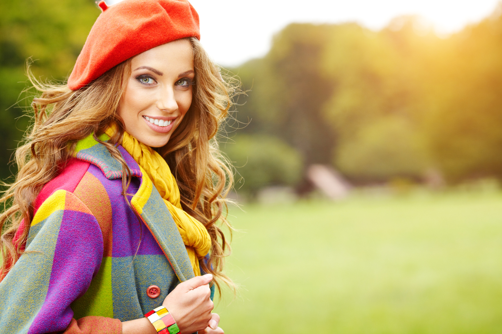 Fashion woman walking in autumn park