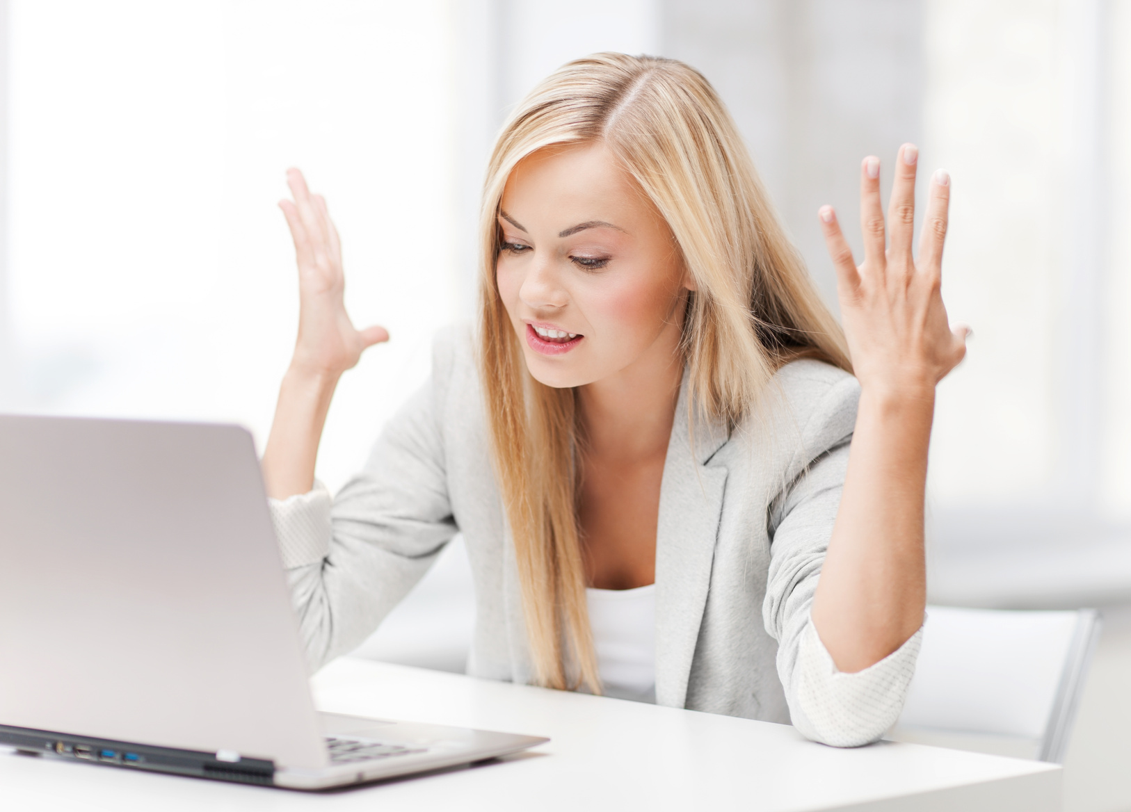 angry woman with laptop