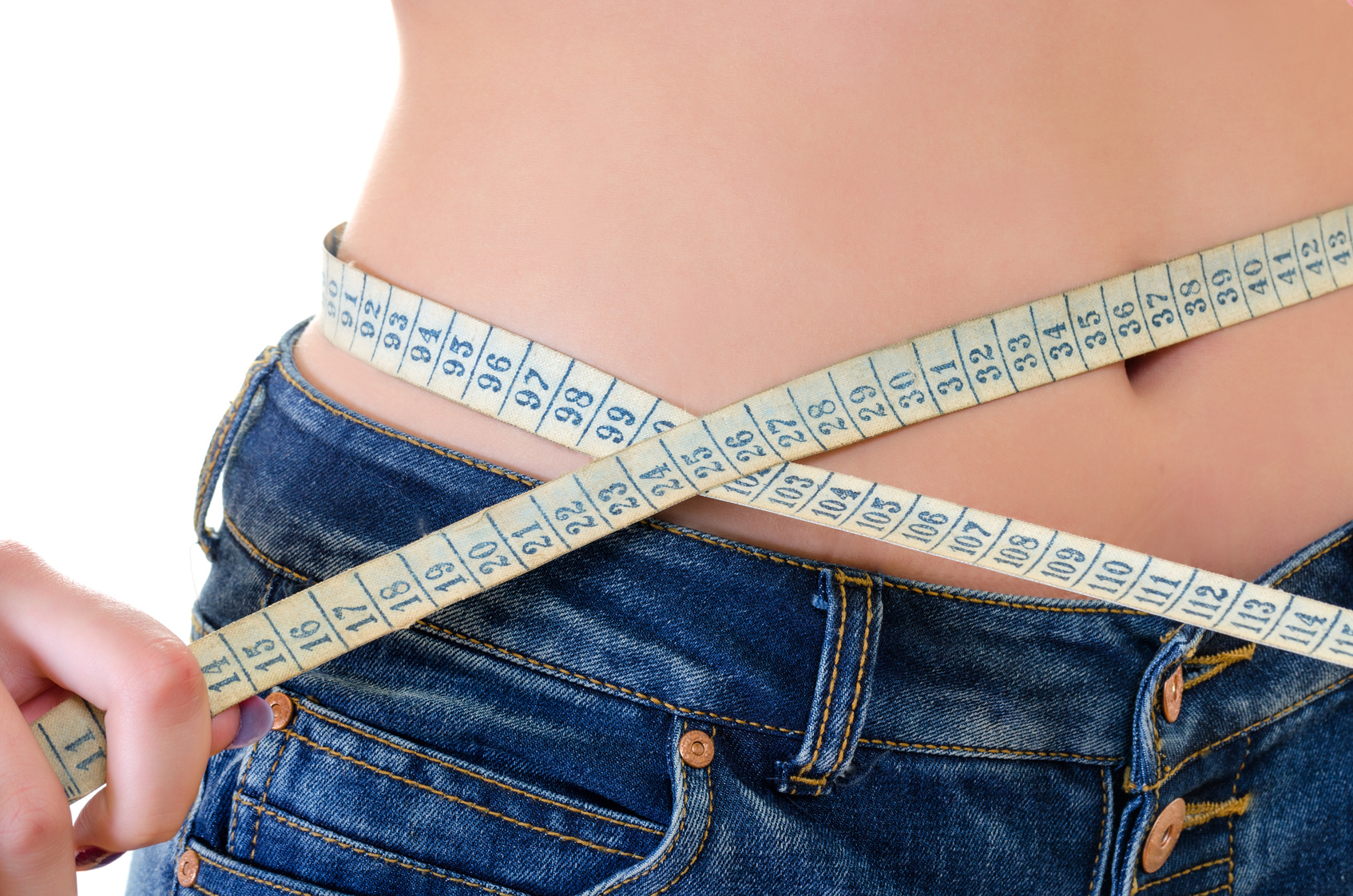 Girl Measure the Waist, Centimeters Tape over White Background