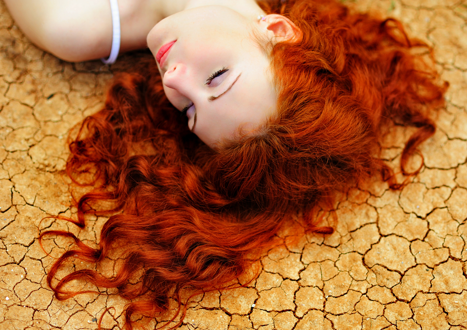 woman on the dried up ground