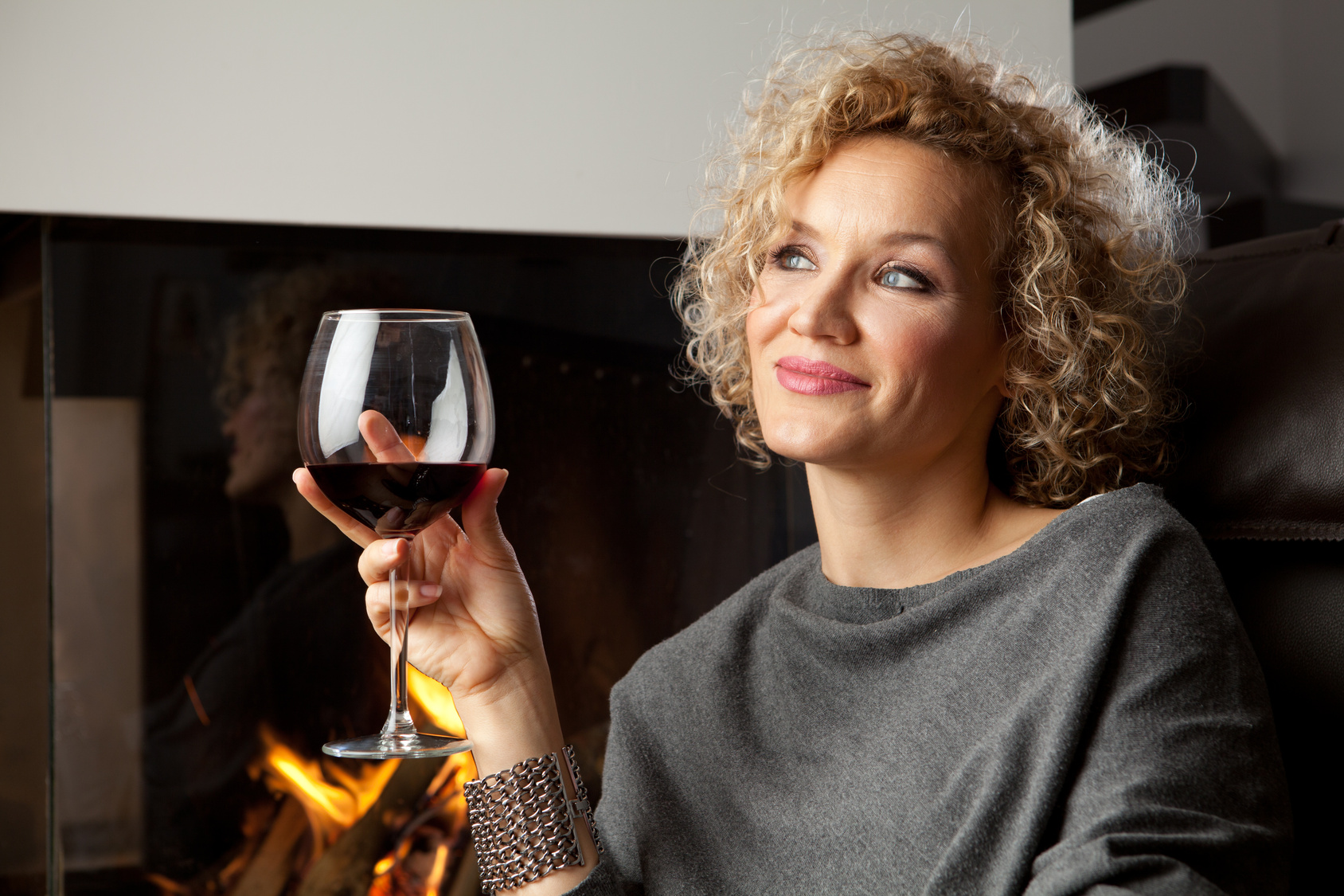 Woman with glass of wine