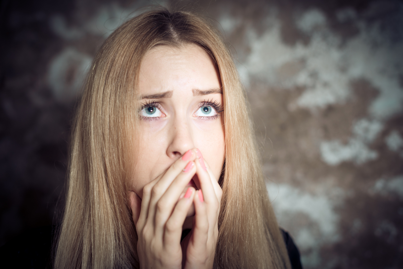 anxious young blonde woman