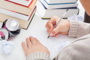 Student drawing a chart