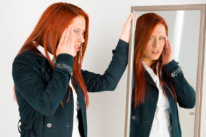 model isolated on plain background confused headache