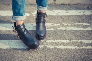 Detail of a girl posing in an urban context