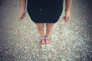 close up of legs women and confetti