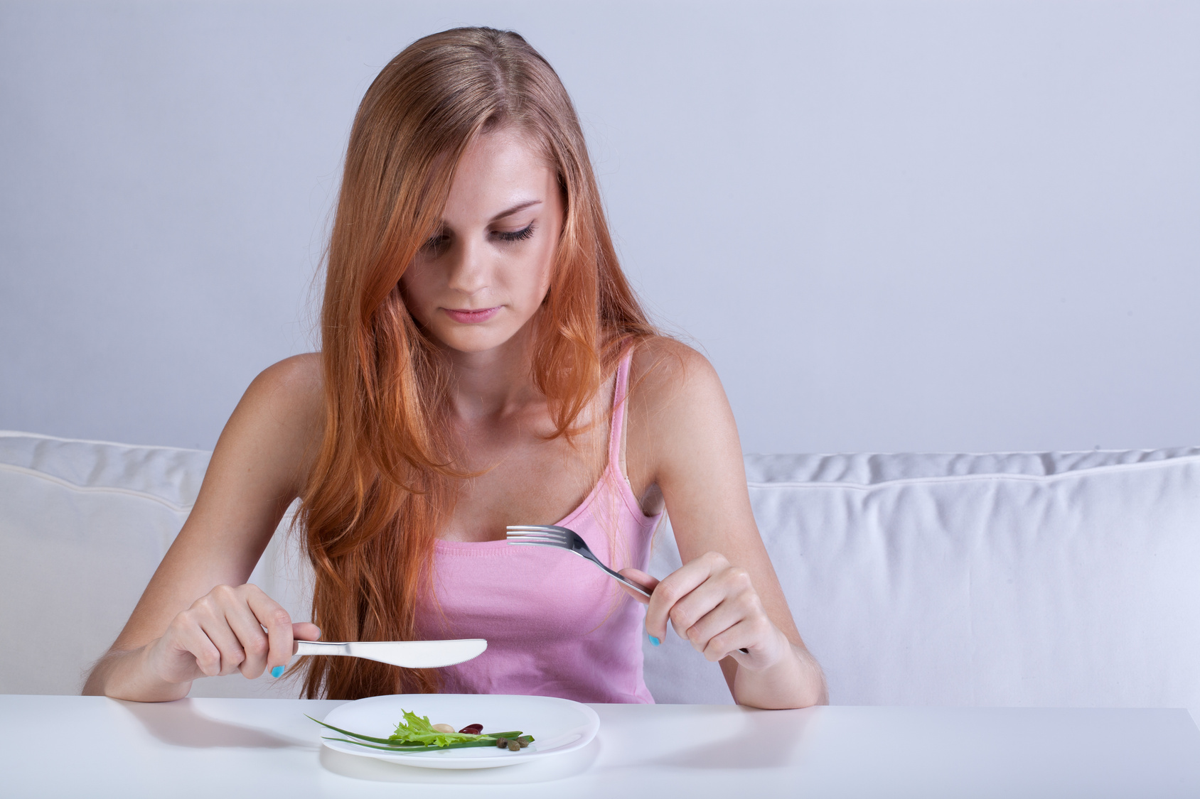 Girl eating very small lunch