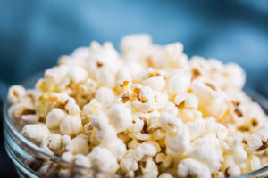 Glass bowl full of popcorn