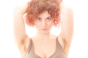 Woman with Hairy Armpits