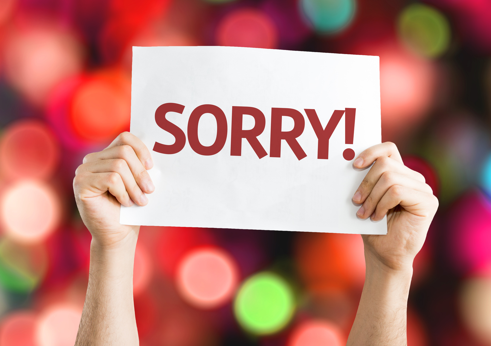 Sorry! card with colorful background with defocused lights