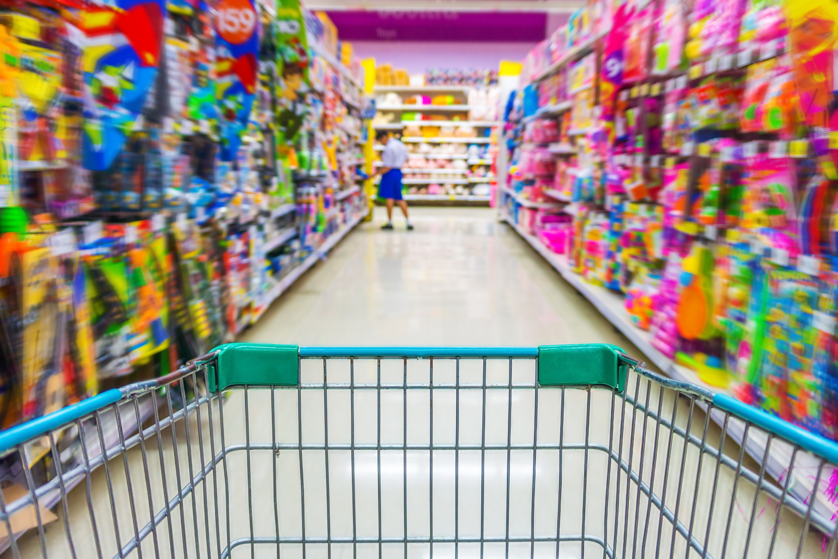 Shopping cart in toys department store