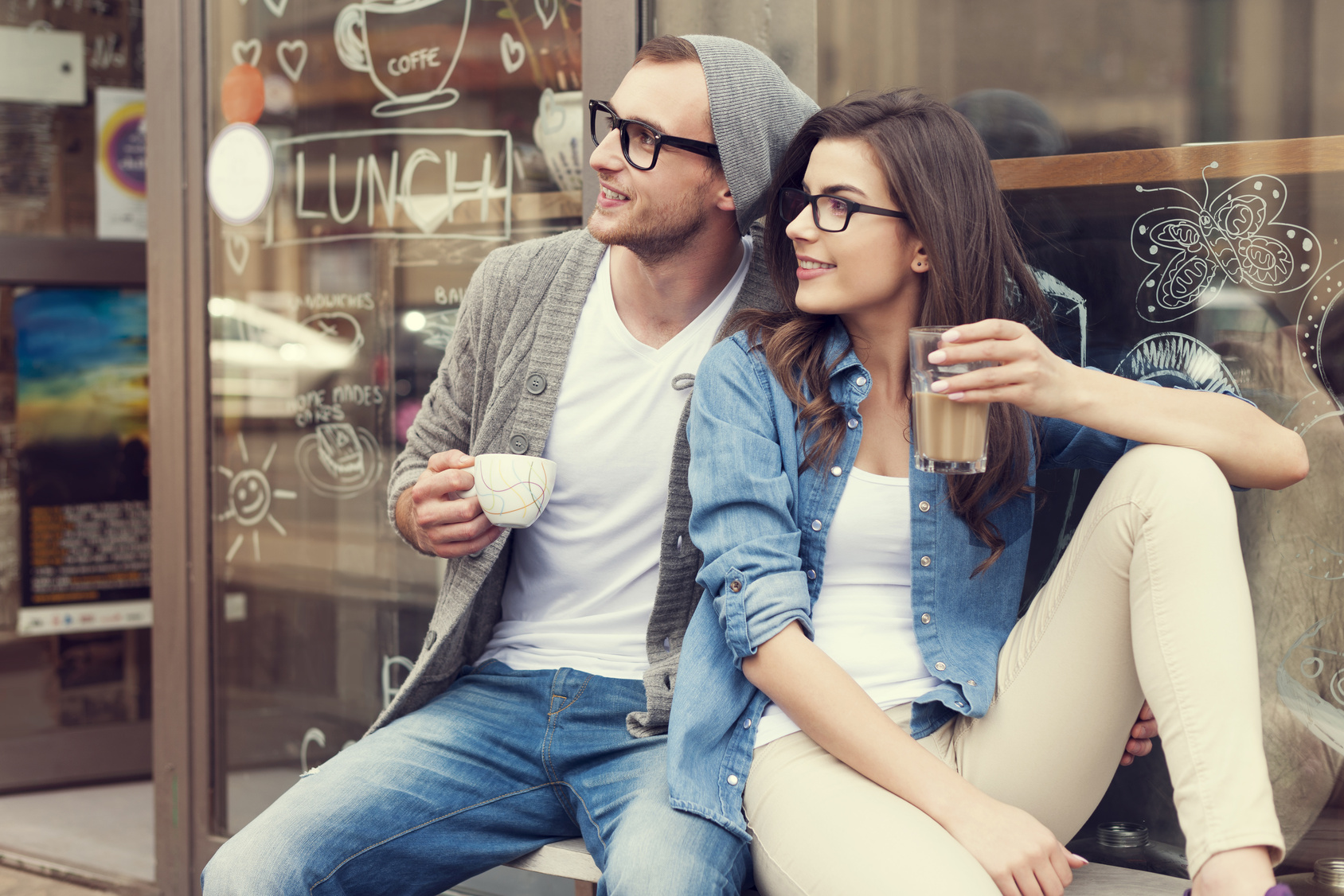 Portrait of stylish couple at outside of cafe