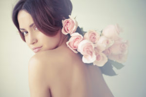 Charming lady with roses