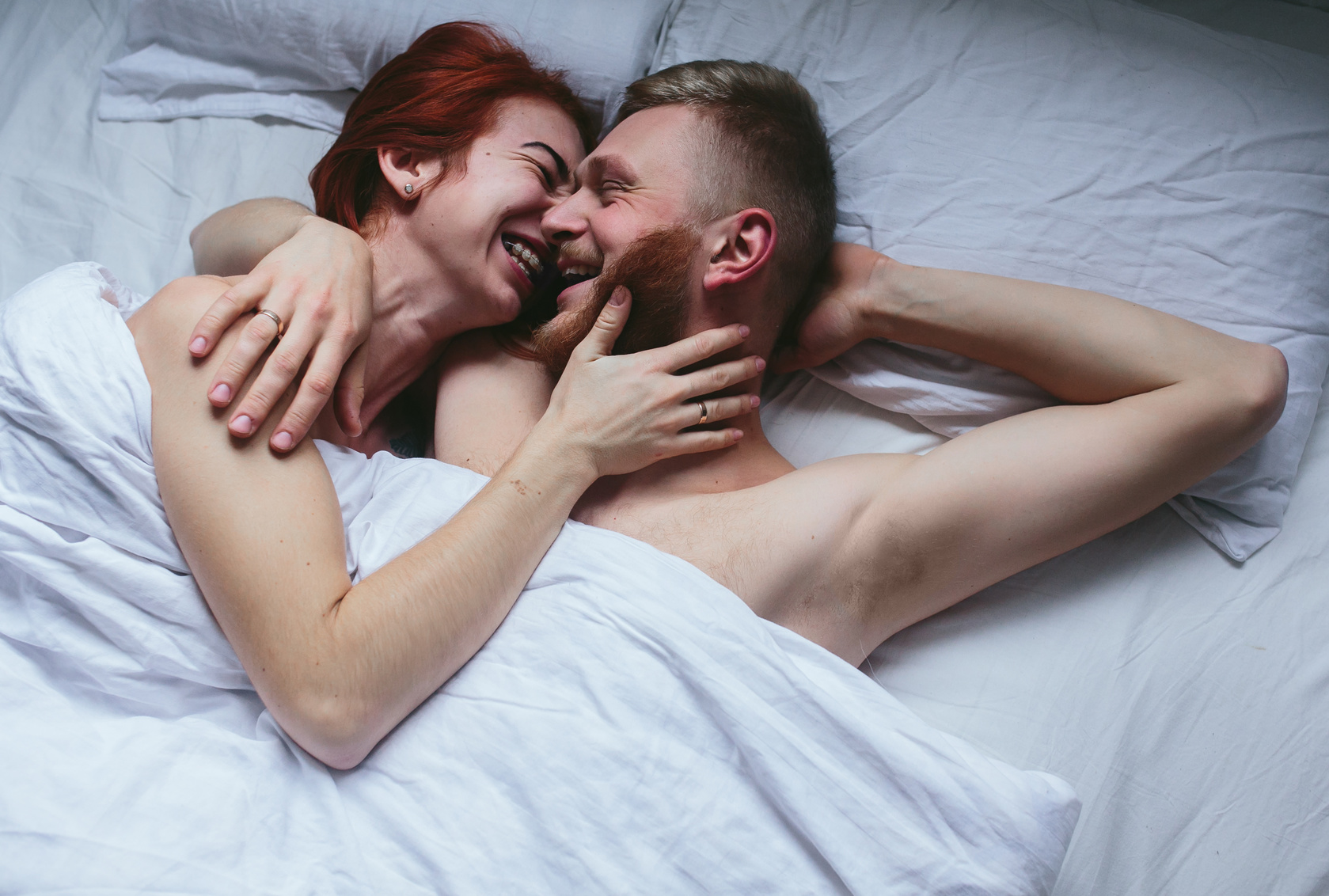 Young couple in bed together