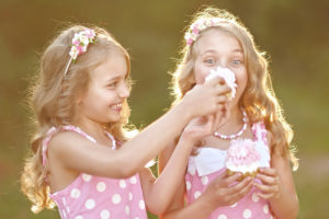Portrait of two little girls twins