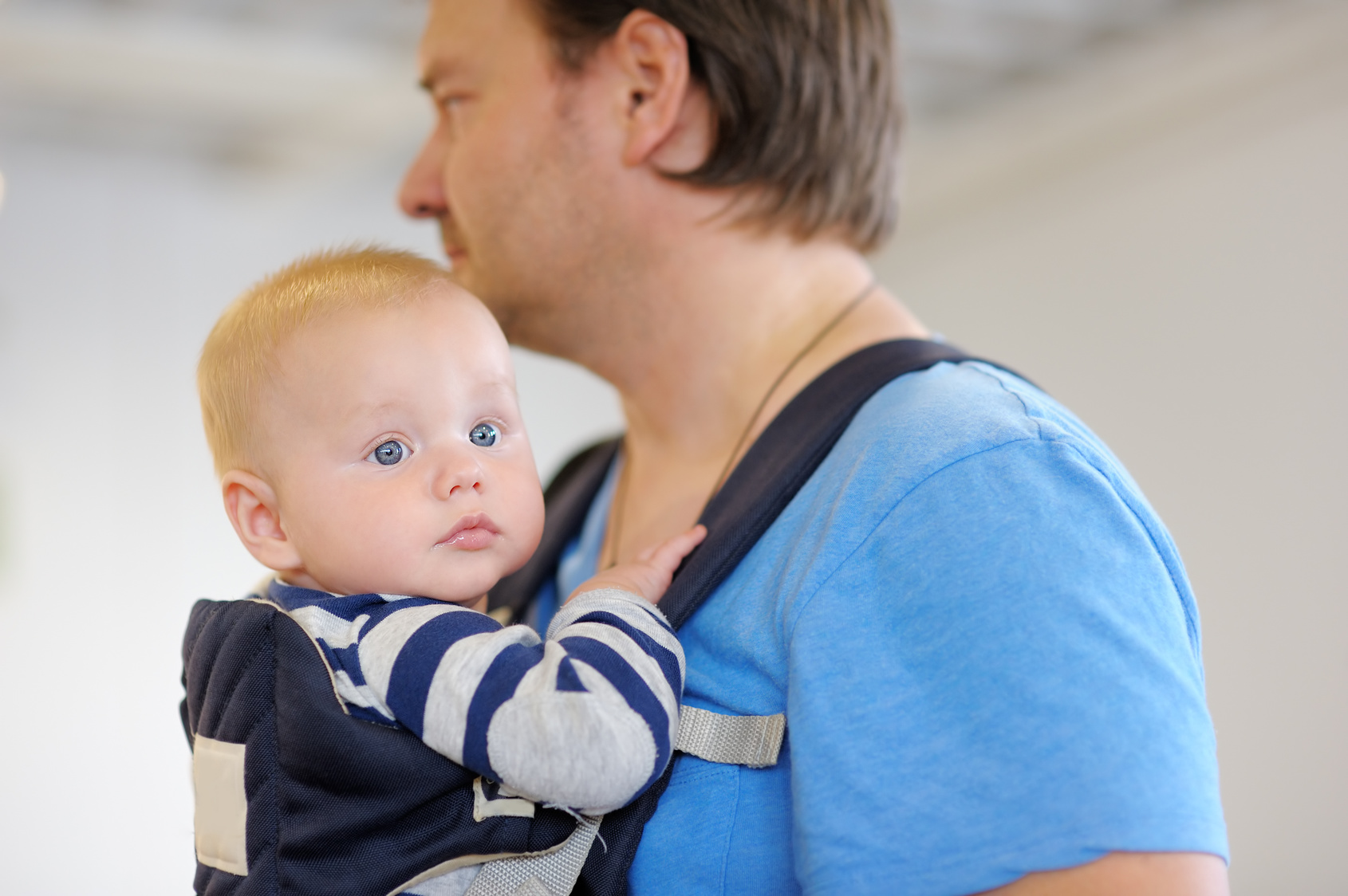 Little baby in a baby carrier