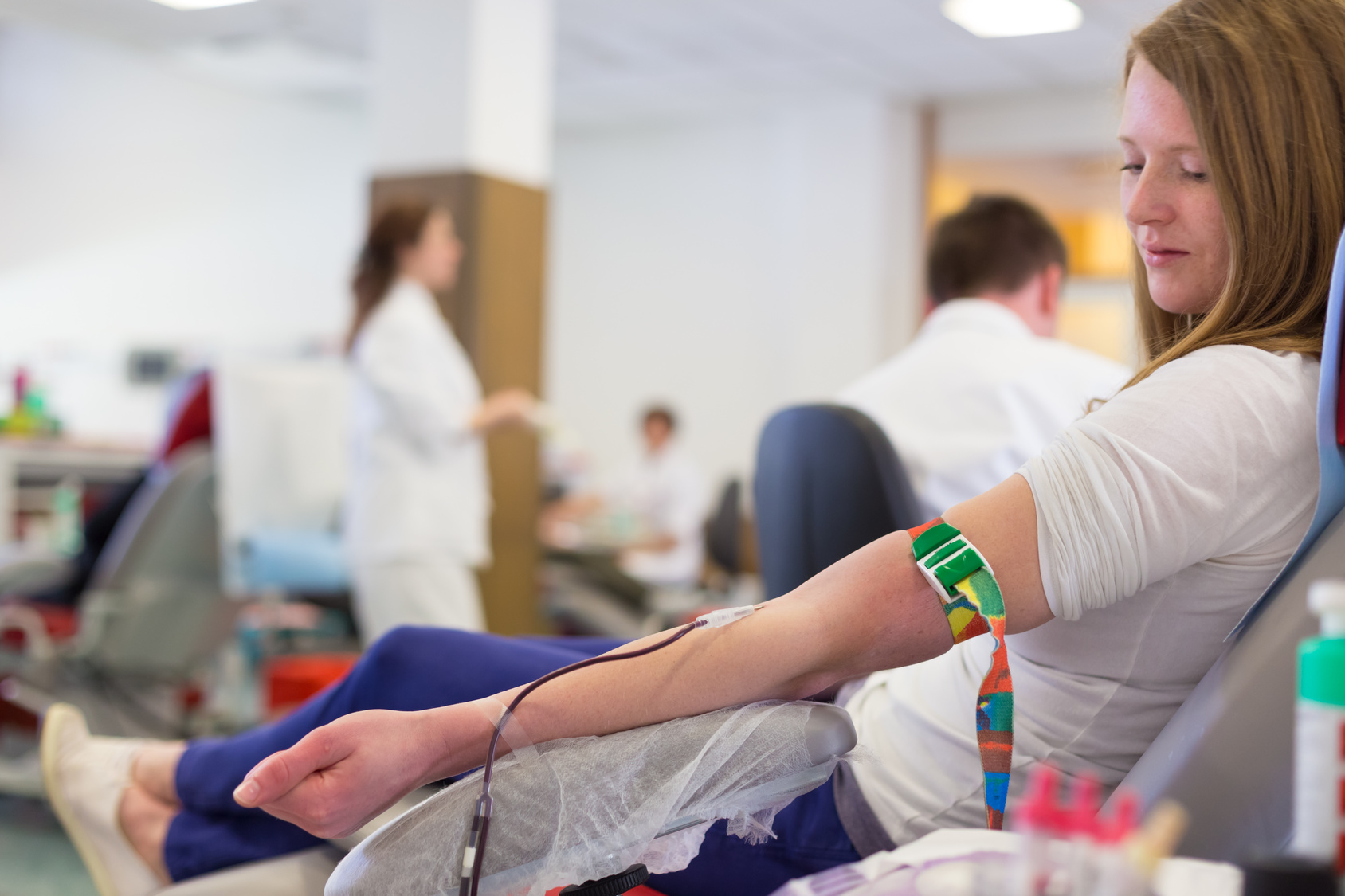 Nurse and blood donor at donation.