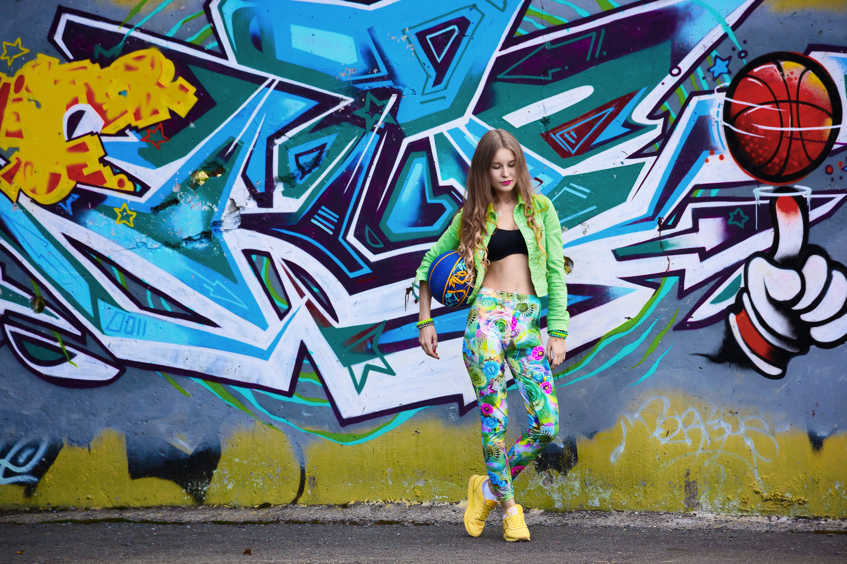 Girl on graffiti background leggings basketball sports