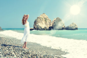 Girl looking to the sea near Aphrodite birthplace, Cyprus