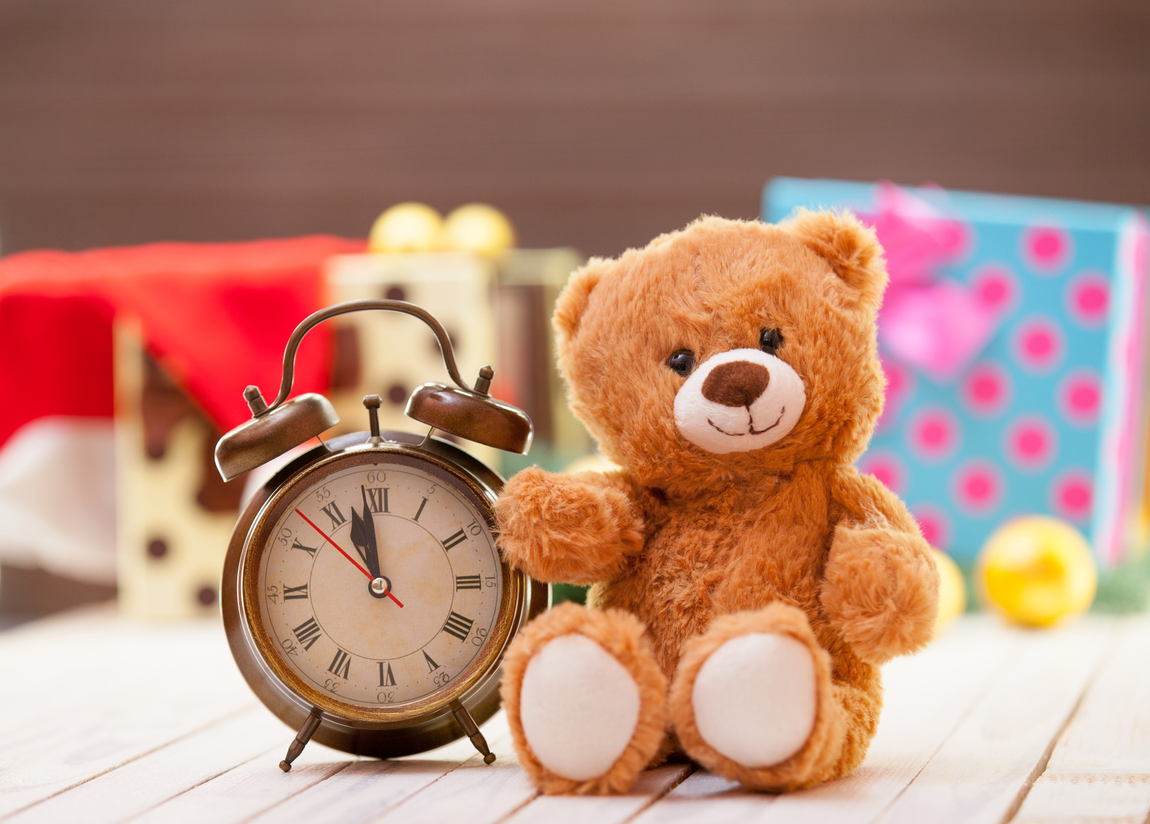 Alarm clock and teddy bear