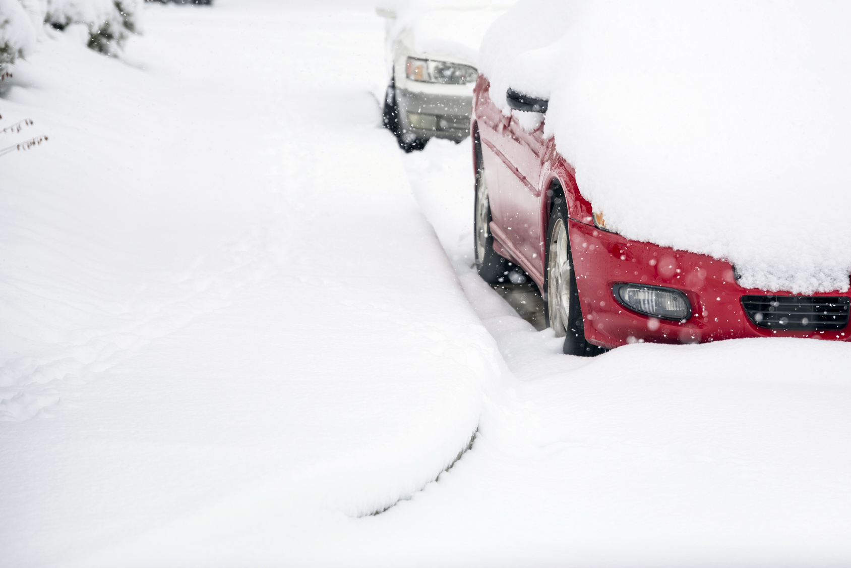 Cars covered with snow winter car