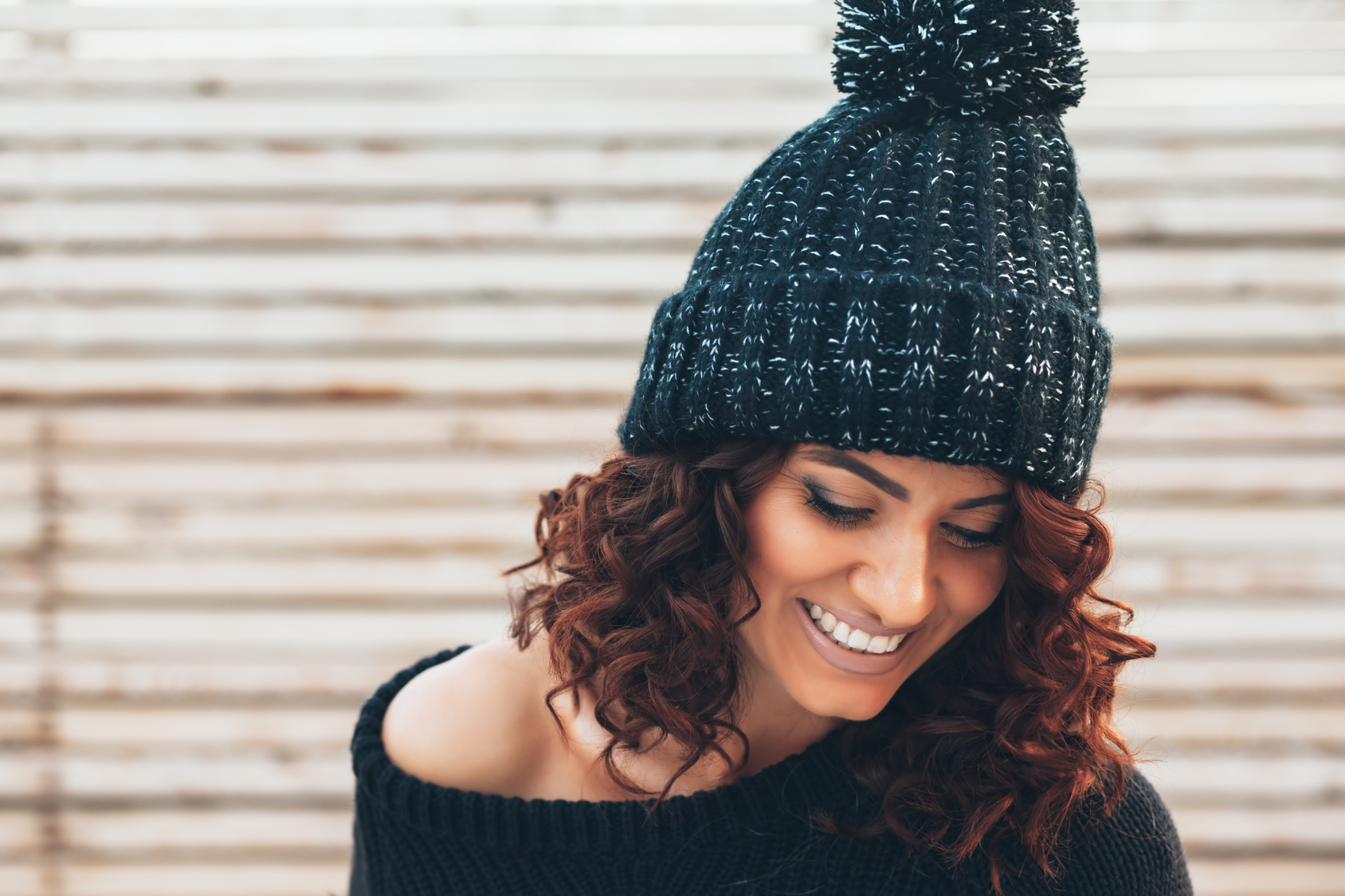 Hipster girl over wooden wall