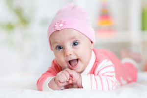 Beautiful baby girl in living room