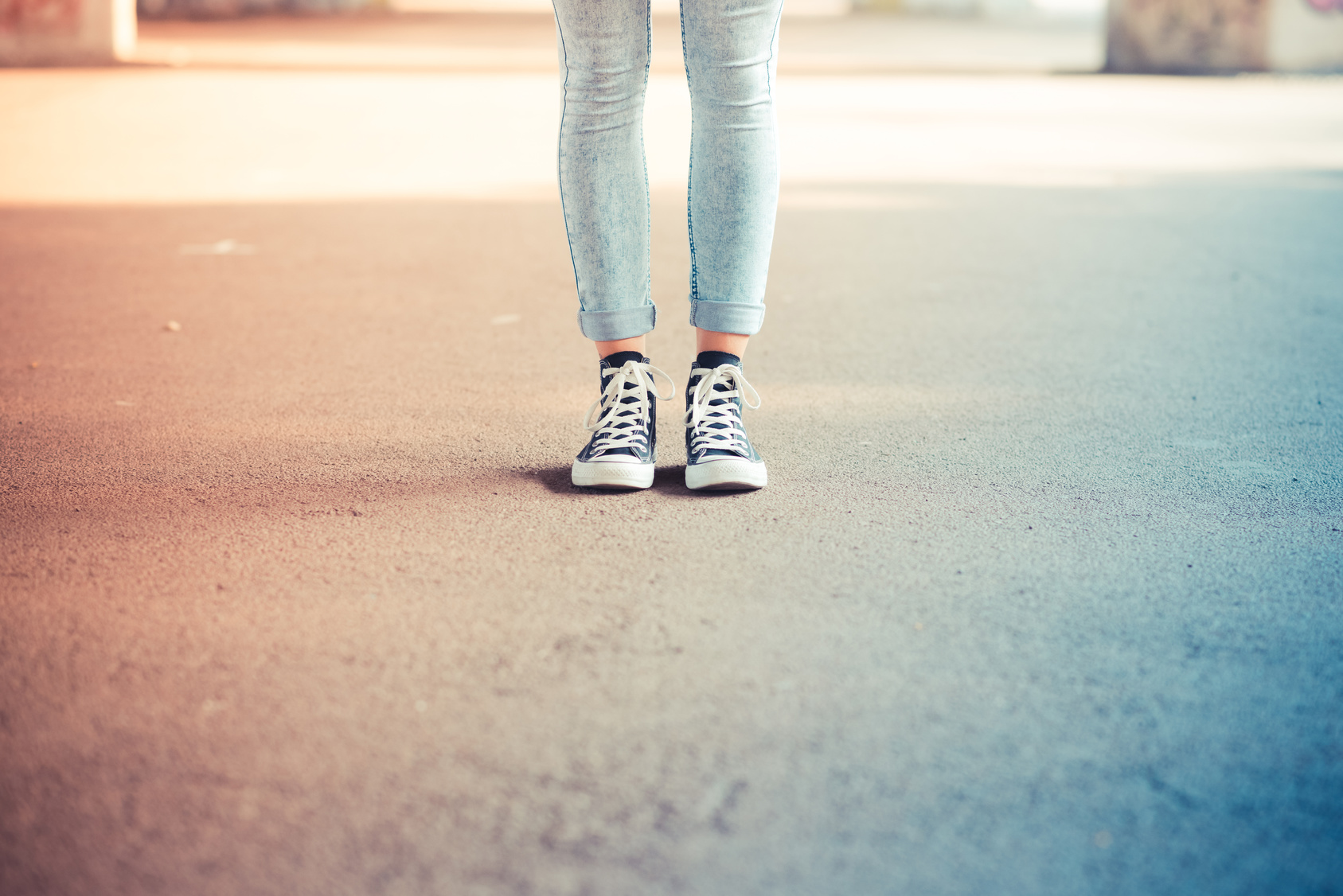 close up of legs woman with leggings and sneakers