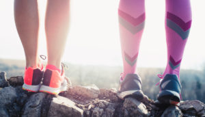 athlete running sport feet on trail healthy lifestyle fitness