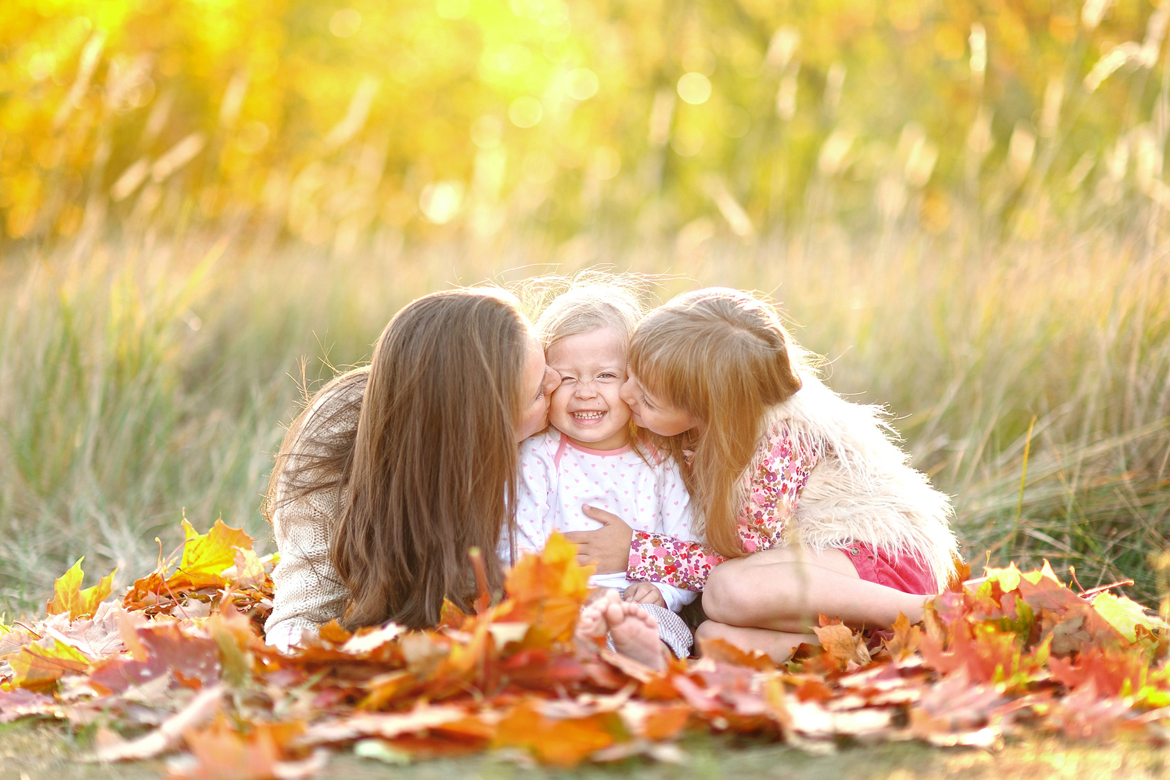 portrait of a beautiful family in autumn