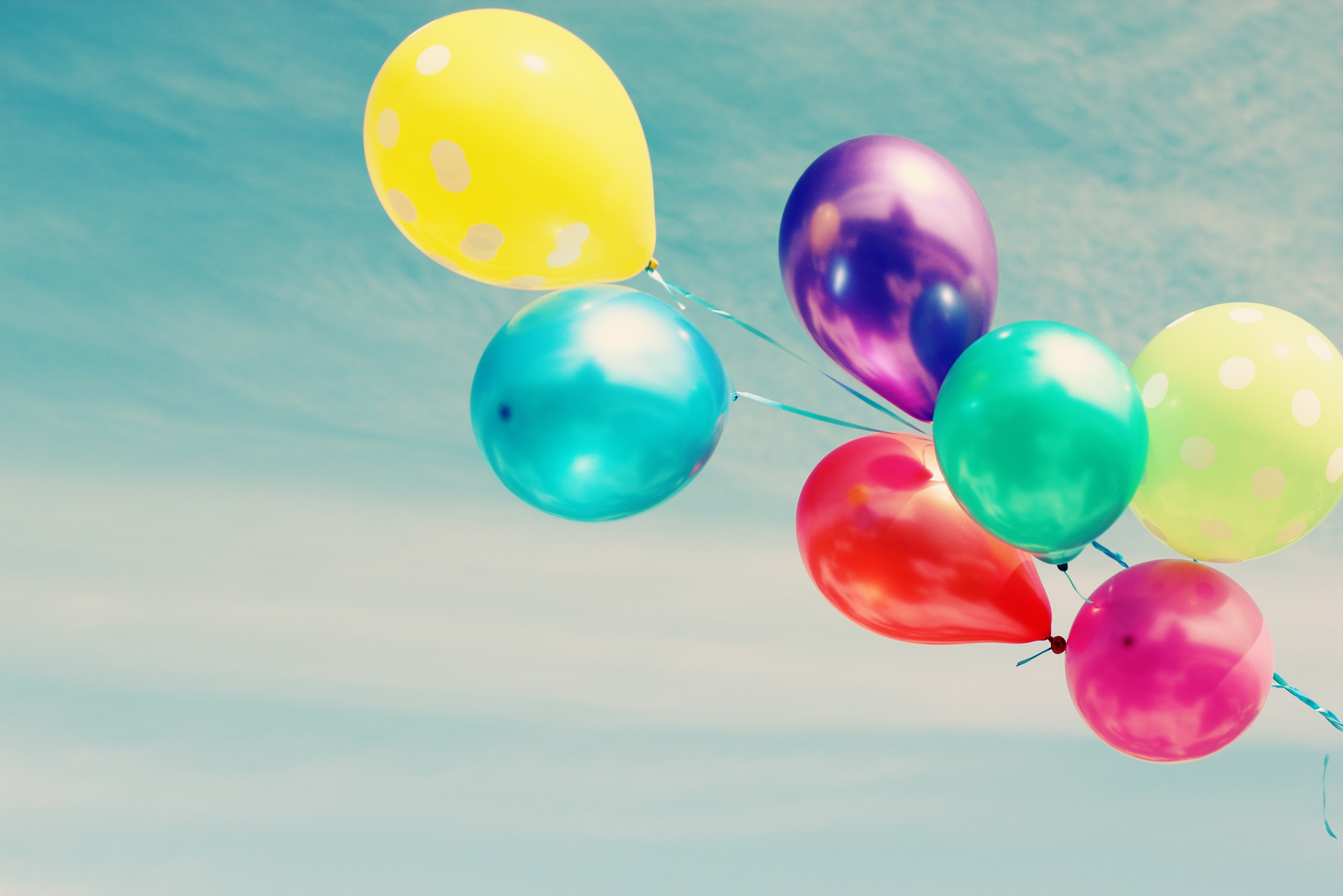 colorful balloons on the background of blue sky