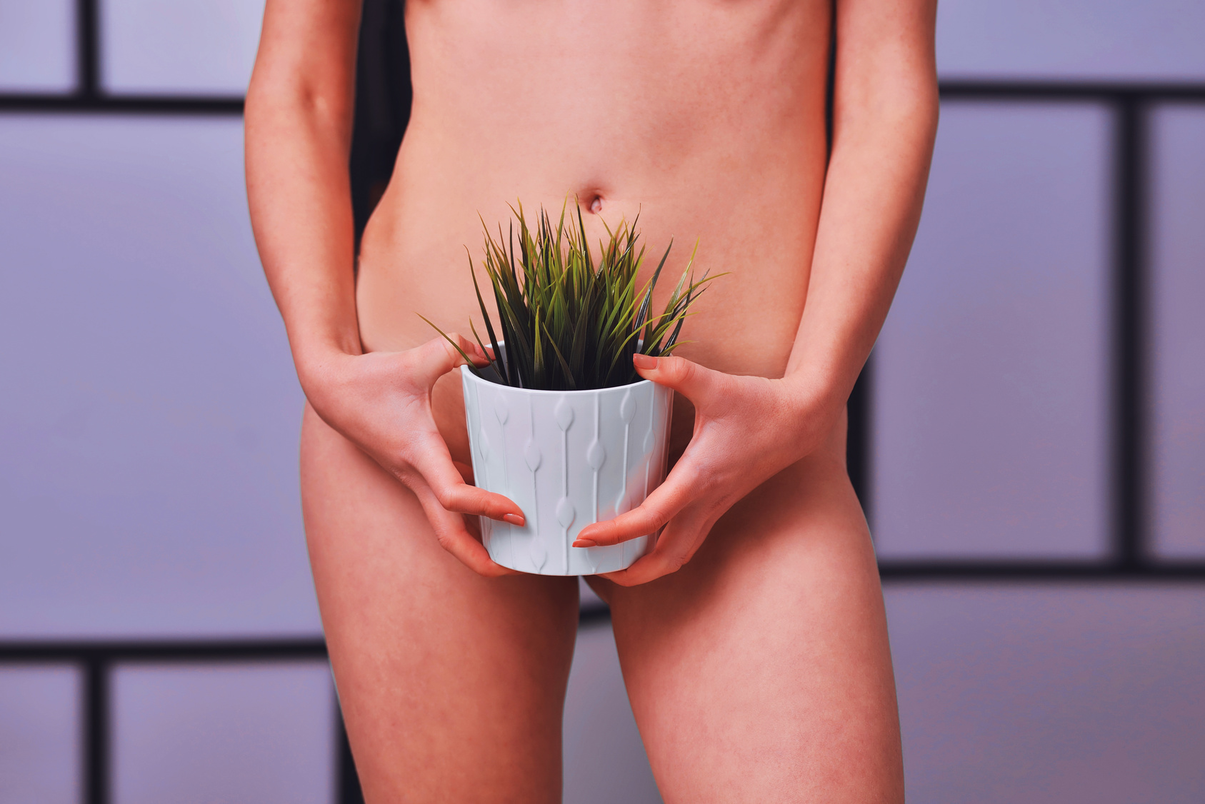 silky female skin with flower in a pot, concept depilation