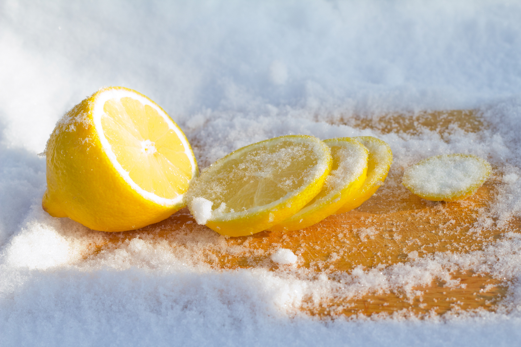 The cooled lemon among ice close up