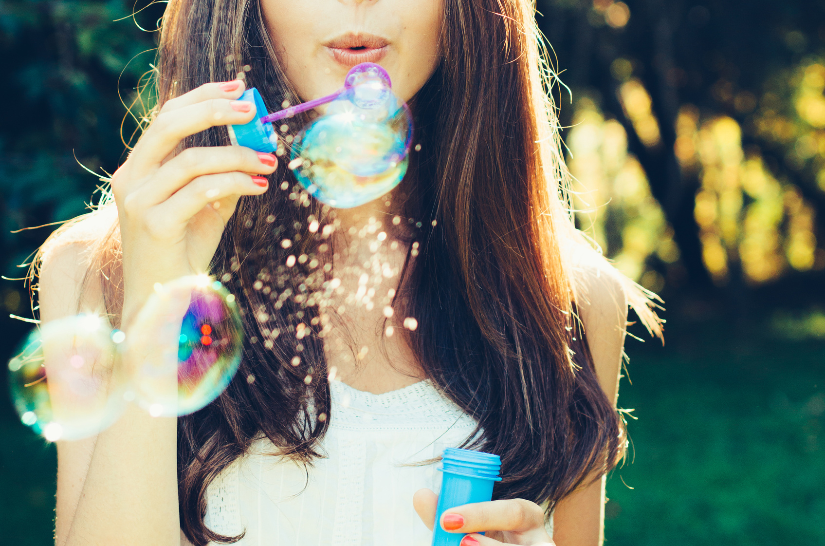 Girl blowing bubbles