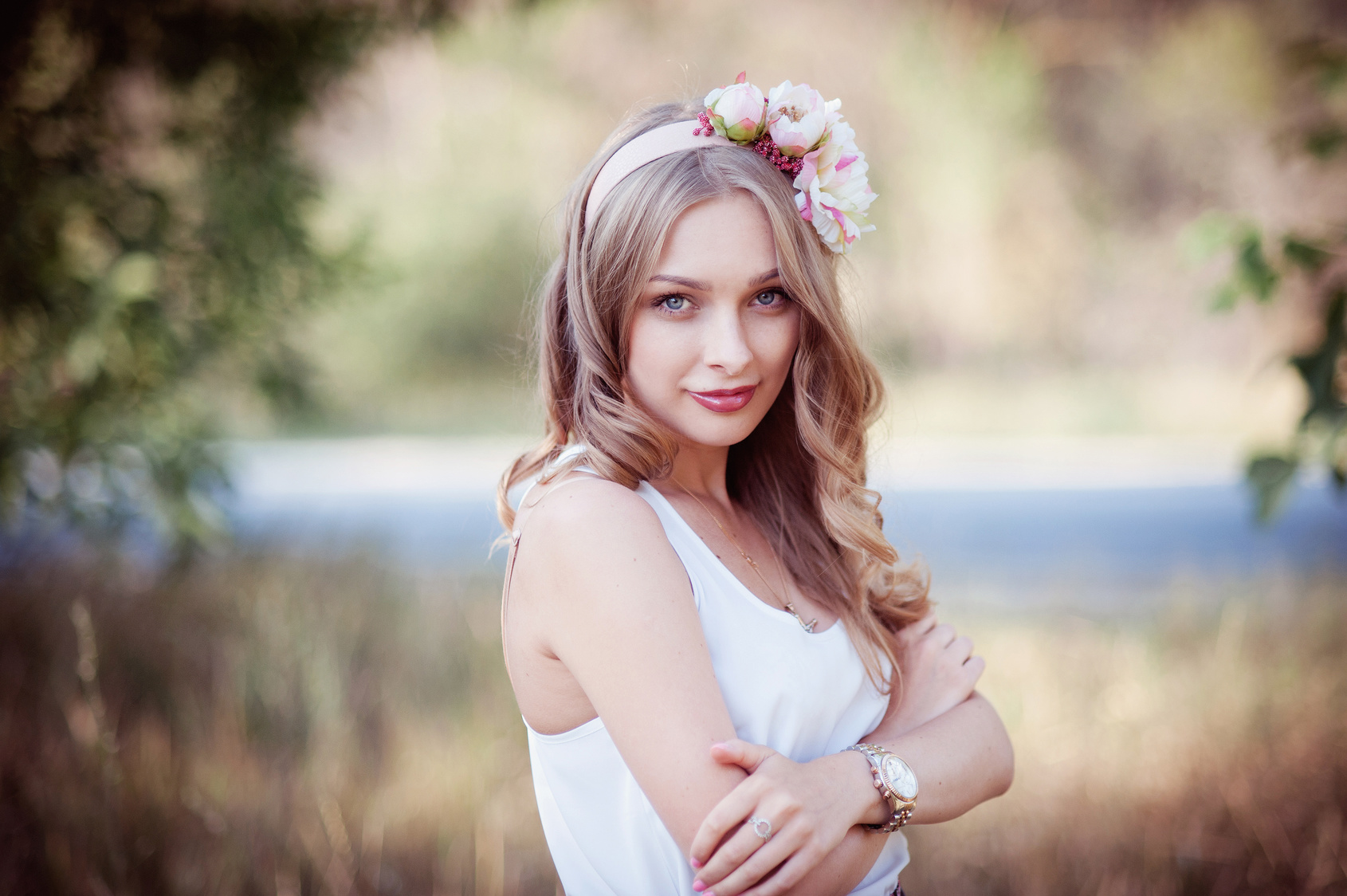 Girl with a wreath of flowers